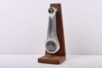 COVENTRY SPEEDWAY: An interesting trophy made from a conrod with Swiss made Swiza clock, mounted to wood. Conventry Speeday emblem to top of conrod. 27cm high.