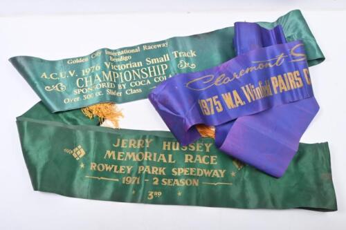 SPEEDWAY SASHES: A collection of three speedway sashes including Jerry Hussey Rowley Park Speedway 1971 2nd season 3rd, Bendigo A.C.U.V 1976 Victorian Small Track Championship 'Over 300cc Slider Class 3rd, and Claremont Speedway 1975 W.A. Winfield Pairs Championship 1st.