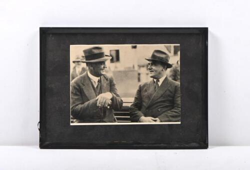 HUNTING BROTHERS: A framed photograph featuring significant/pioneer speedway promoters AJ Hunting & Frank Hunting of 23 Sturt Street Ballarat. Responsible for introducing speedway at Melbourne Exhibition, Maurabra NSW and Brisbane before taking speedway overseas to England in 1928. Frame measures 30.5cm wide, 22cm high.