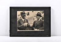 HUNTING BROTHERS: A framed photograph featuring significant/pioneer speedway promoters AJ Hunting & Frank Hunting of 23 Sturt Street Ballarat. Responsible for introducing speedway at Melbourne Exhibition, Maurabra NSW and Brisbane before taking speedway o