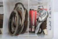 AMAL: A plastic container containing Amal carburettor parts and other motorcycle assortments. - 2