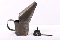 TOOLS: A metal oil can and chain cutter