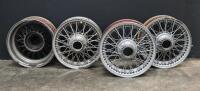 JAGUAR: A set of four Jaguar XK 140/150 16 inch wire wheels. Used.