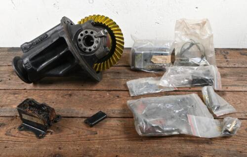 LOTUS: A Lotus 1:3.5 differential from a Lotus Elan, with housing and internals appears rebuilt, with other associated parts