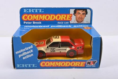 BROCK: A 1:43 scale motorized pullback model of Peter Brock & Larry Perkins 1983 Holden VH Commodore #05 by Ertl. In original box.