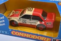 BROCK: A 1:43 scale motorized pullback model of Peter Brock & Larry Perkins 1983 Holden VH Commodore #05 by Ertl. In original box.&nbsp; - 2