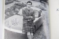 JIM CLARK: A Jim Clark signed copy of 'Jim Clark At The Wheel' by Arthur Barker. - 2