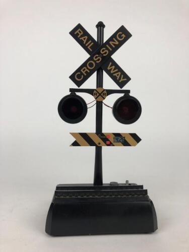 CLOCK: A novelty railway crossing digital clock, 28.5cm high