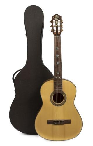 A Antonio Tsai classical acoustic guitar with&nbsp;mother of pearl,&nbsp;rose inlay on the back of the body and&nbsp;the neck of the guitar