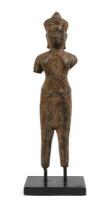 A Khmer style painted metal figure on ebonised base, 47cm high overall