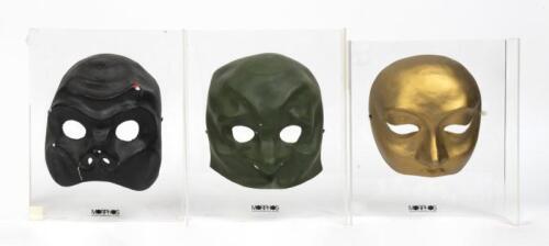 Three Venetian life size hand made plaster masks by Morphos, mounted on&nbsp;perspex basis,&nbsp;in black, gold and olive green