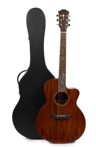 A 6 string&nbsp;acoustic guitar with mother of pearl inlay on&nbsp;the fret board showing a flower design&nbsp;