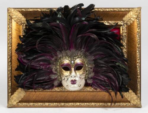 A Venetian life size hand painted&nbsp;plaster mask&nbsp;with elaborate feather surround, inset within Italia Cornici frame, made in Italy,