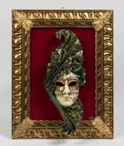 A Venetian life size hand painted&nbsp;plaster female mask&nbsp;with elaborate fabric design, inset within Italia Cornici frame,&nbsp;within tailor made cardboard box
