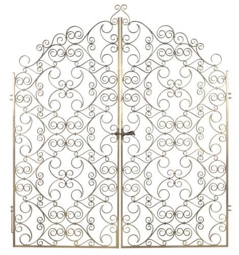 A set of golden Regence&nbsp;style&nbsp;gilt wrought iron&nbsp;gates, 261.5cm high, 116.5cm wide each, (233cm overall)