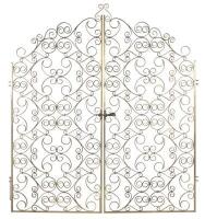 A set of golden Regence&nbsp;style&nbsp;gilt wrought iron&nbsp;gates, 261.5cm high, 116.5cm wide each, (233cm overall)