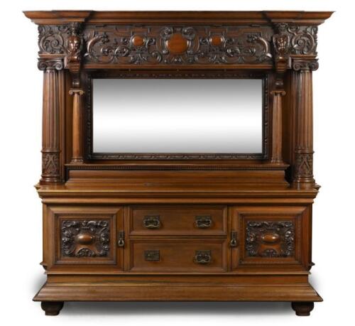 A large and impressive 19th century carved walnut sideboard, stamped&nbsp;Maple & Co Ltd England, 234cm high, 228cm wide, 76cm deep