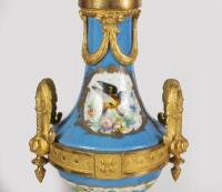 A 19th century French Sevres pattern porcelain and gilt-bronze clock garniture, 48cm high - 5