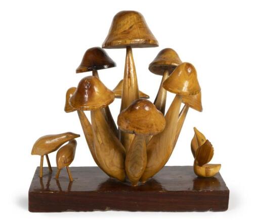 A carved wooden mushroom garden, table decor with birds surrounding, 42cm high
