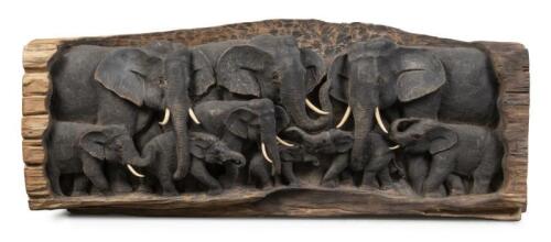 A decorative carved timber plaque featuring a herd of elephants,&nbsp;47cm high, 119.5cm wide