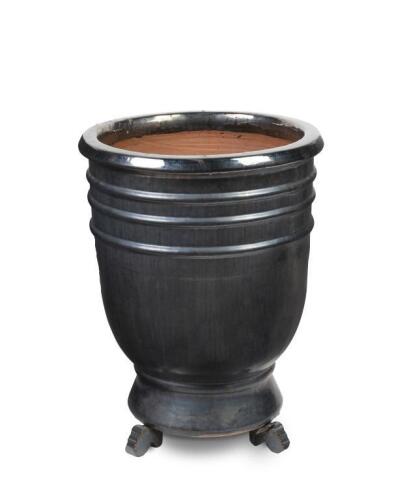 A large and impressive grey-glazed planter, 67cm high