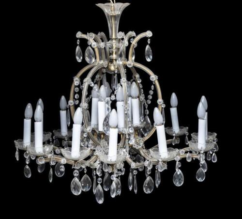 An 18 light cut crystal glass chandelier, 88cm high, 89cm wide