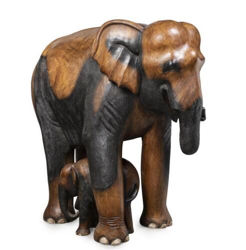 A very large solid teak elephant with calf beneath, 119cm high, 128cm long, 65cm wide