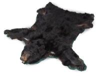 A medium sized North American black bear rug, 170cm long [Ex-Bonhams 2010, Sale 19041, Lot 757]