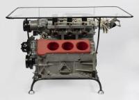 A superbly designed steel framed, glass topped coffee table featuring a gutted Ferrari Dino Motor with faux injection, etched glass top reading 'Ludovico Scarfiotti European Mountain Champion 1965', with prancing horse motifs to corners.&nbsp; - 2