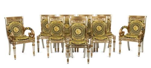 A set of 10 Versace&nbsp;style Vanitas dining chairs, include 8 dining and two carvers, hard carved with seat and back upholstered with Italian Versace fabric 90cm high