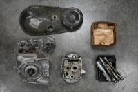 TRIUMPH TRW: A collection of Triumph TRW spares including a set of crank cases, set of fly wheels, four cams for fitting in crank case, timing side chain cover, gear box inner, set of valve springs and assortment of timing side bearings.&nbsp;