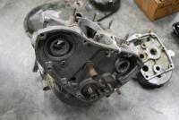TRIUMPH TRW: A collection of Triumph TRW spares including a set of crank cases, set of fly wheels, four cams for fitting in crank case, timing side chain cover, gear box inner, set of valve springs and assortment of timing side bearings.&nbsp; - 6