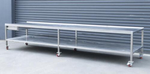 A high grade rollable&nbsp;double tear&nbsp;stainless steel industrial cooking bench, table measures 483cm
