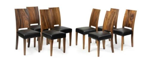 A set of 17 modern timber dining chairs, some unused in cardboard wrapping.&nbsp;Each approx 105cm tall.