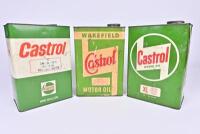 CASTROL: Three Castrol one gallon oil cans&nbsp;of varying periods.