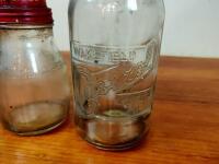 CASTROL: Two glass oil bottles with tin 'XL Medium Super Grade' pourers, one embossed 'Castrol Wakefield' - 2