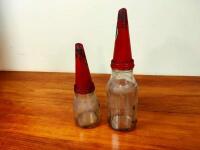 CASTROL: Two glass oil bottles with tin 'XL Medium Super Grade' pourers, one embossed 'Castrol Wakefield' - 3