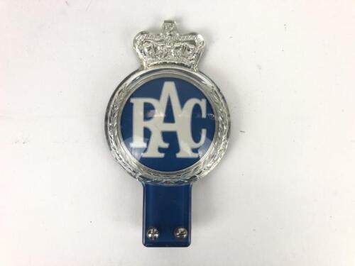 R.A.C: A Royal Automobile Club badge. Registered number E 143910