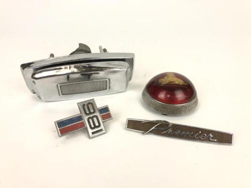 HOLDEN: A group of Holden parts/badges
