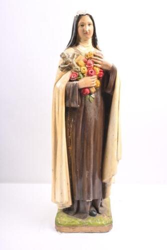 A c1950s plaster figure of Saint Therese approx 61cm tall.&nbsp;