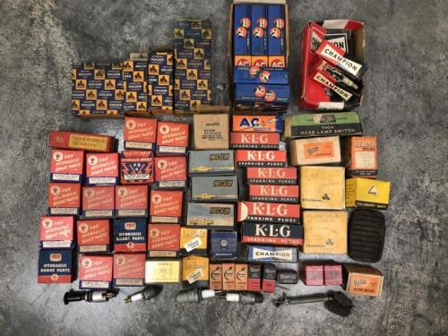 BULBS/SPARK PLUGS/BEARINGS: A quantity of various car parts including bearings, light bulbs,spark plugs
