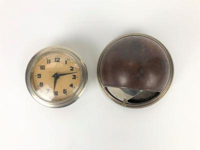 FORD PARTS: Two Ford car items including an ashtray and wind-up clock