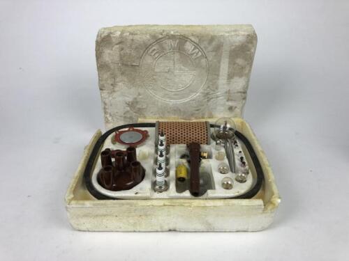 B.M.W: An interesting and rare B.M.W service box, with distributor cap, spark plugs, filter, etc. Circa late 1960's - 1970's