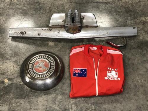HOLDEN: Three Holden items. FJ grill and hubcap