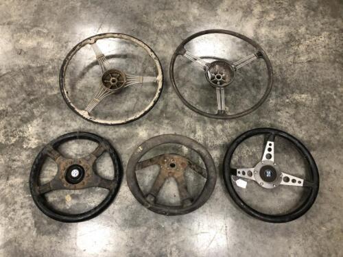 STEERING WHEELS: Five assorted steering wheels. Ford and Leyland steering wheels