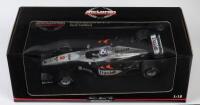 McLAREN: A NOS 1:18 scale Minichamps Formula 1 McLaren Mercedes 2000 MP 4/15 D. Coulthard die-cast model