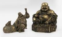 BUDDHIST FIGURES: Two Chinese metal and brass Buddhist figures, approximately​​​​​​​ 18cm high, 15cm wide