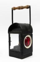 LAMP: A handheld rustic old black lamp with wooden handle, marked E.C.V