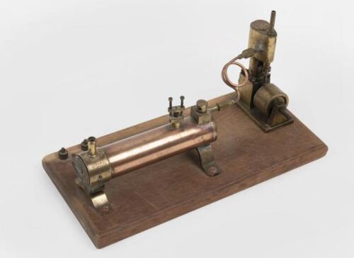 STEAM ENGINE: A brass and copper steam 'donkey engine' on wooden base, not tested, 27cm wide.