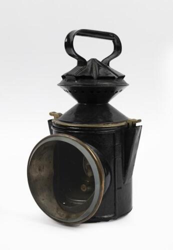 LAMP: A black railway guards lamp labelled 'Guard Carrol'.